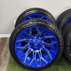 New 22x12 blue fuel wheels wrapped in 305/40r22 lexani tires 8 lug 8x6.5 bolt pattern