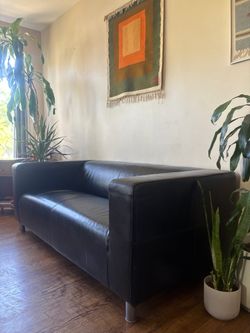 Sleek Modern Black Leather Sofa