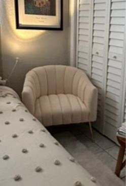 Cream colored suede accent chair
