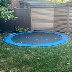 in-ground trampoline (no support stands)