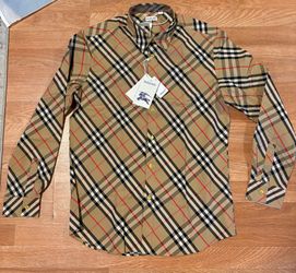 B brown shirt