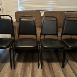 All black metal chairs