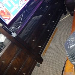 Huge And Solid Dark Oakwood Wall Unit With TV And Glass Shelves And Lighting