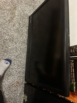Two Flat Screen Tvs