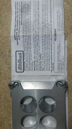 Edelbrock square bore carb to spread-bore manifold adapter