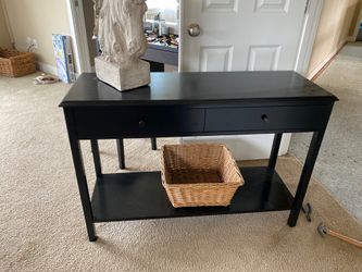 Black side entry sofa table with drawers