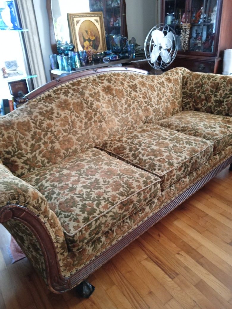 Vintage Sofa w/ 2 front Claw Feet, Three Cushions, Curved Arms And Back