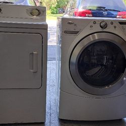 G&E gas dryer and whirlpool washer in working condition 