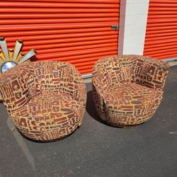 Pair of swivel chairs by Sherrill