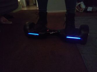 Swagtron Hoverboard. Like new. Only used a few times. Kids didn't like it. Has Bluetooth speaker built in and charger included