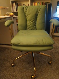 Green desk chair w/ gold accents