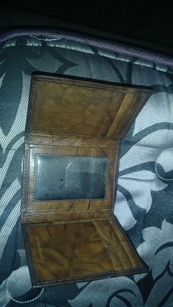 Brown leather trifold wallet