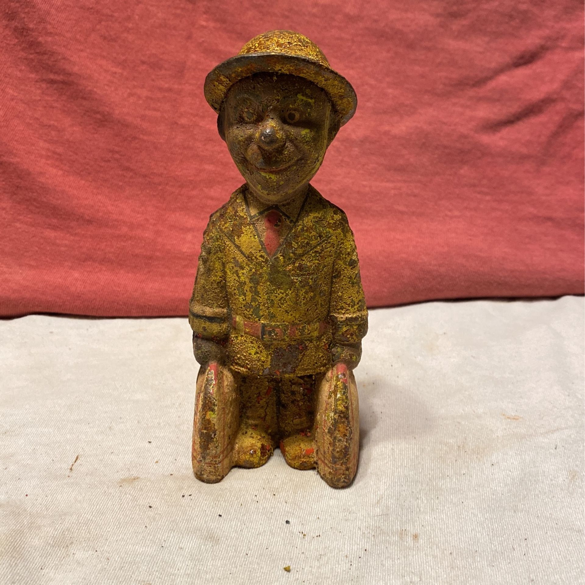  Cast-iron WWll Soldier bank. 