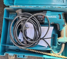Makita HR2475 Rotary Hammer delivers 2.7 Joules of impact energy with a 3-mode selector for drilling, hammering with rotation, and chipping.