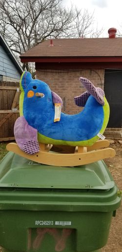 musical dolphin-shaped rocker for babies