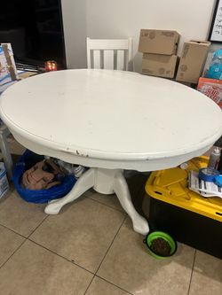 white dining room table and chairs