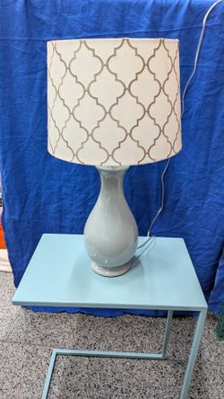 Spa green ceramic lamp with Moroccan print lamp. $20