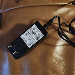 J. POWER  AC/DC ADAPTER 