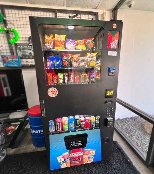 Compact Combo Vending Machine With A Credit Card Reader Installed