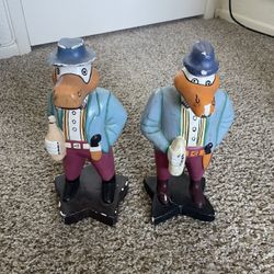 These are hand-carved and painted duck figurines, often referred to as "Albert the Duck" or similar styles of wooden duck decor. 