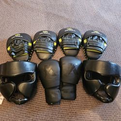 1 set - Kaiwende faux leather training gloves
2 sets - Sanabul curved boxing punch mitts
2 - FitsT4 boxing leather Muay Thai sparring helmet size L/XL