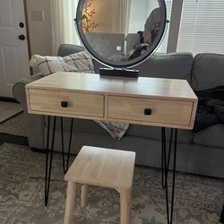 Vanity with lighted mirror