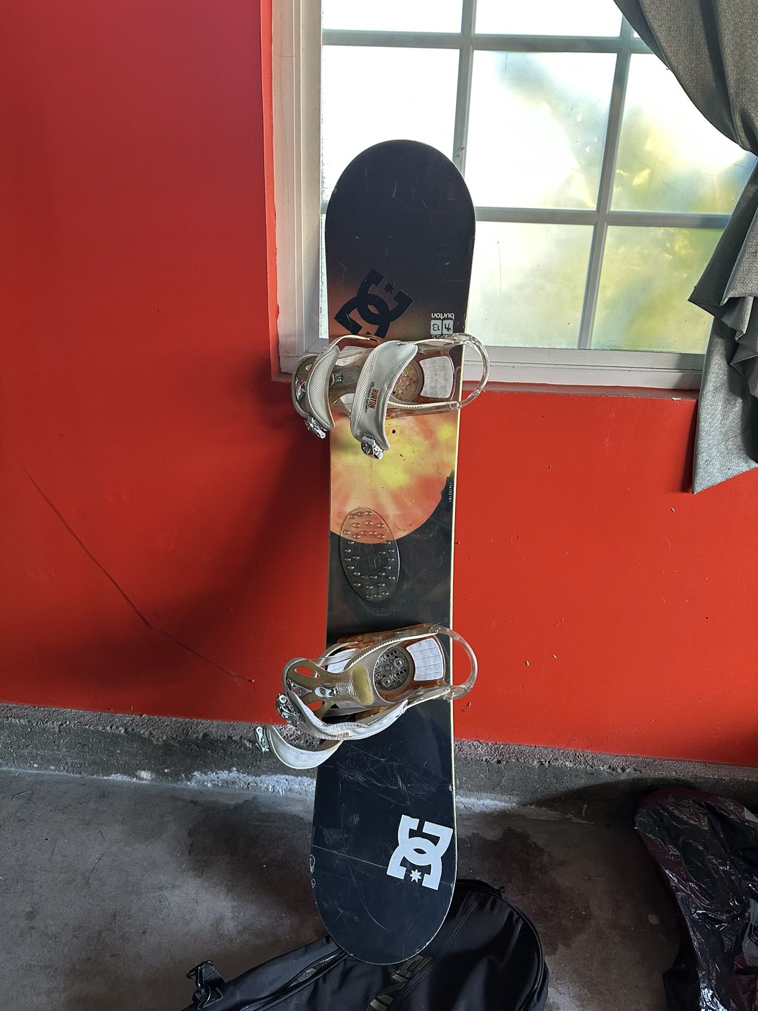 Burton Snowboard and travel bag