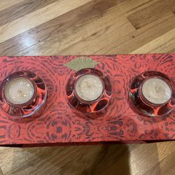 Glass candle holder with candle ( new $10 for 3)