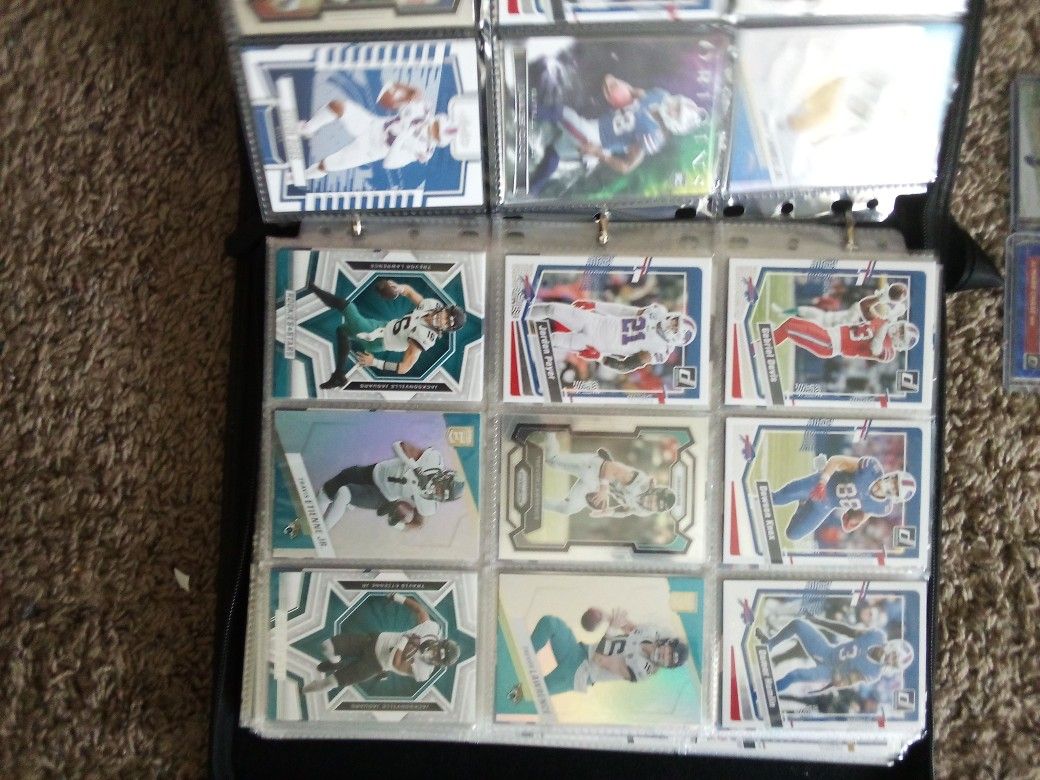 Binder With Assorted Baseball And Football Cards