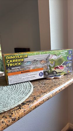 Kids dinosaur toy NEVER OPENED