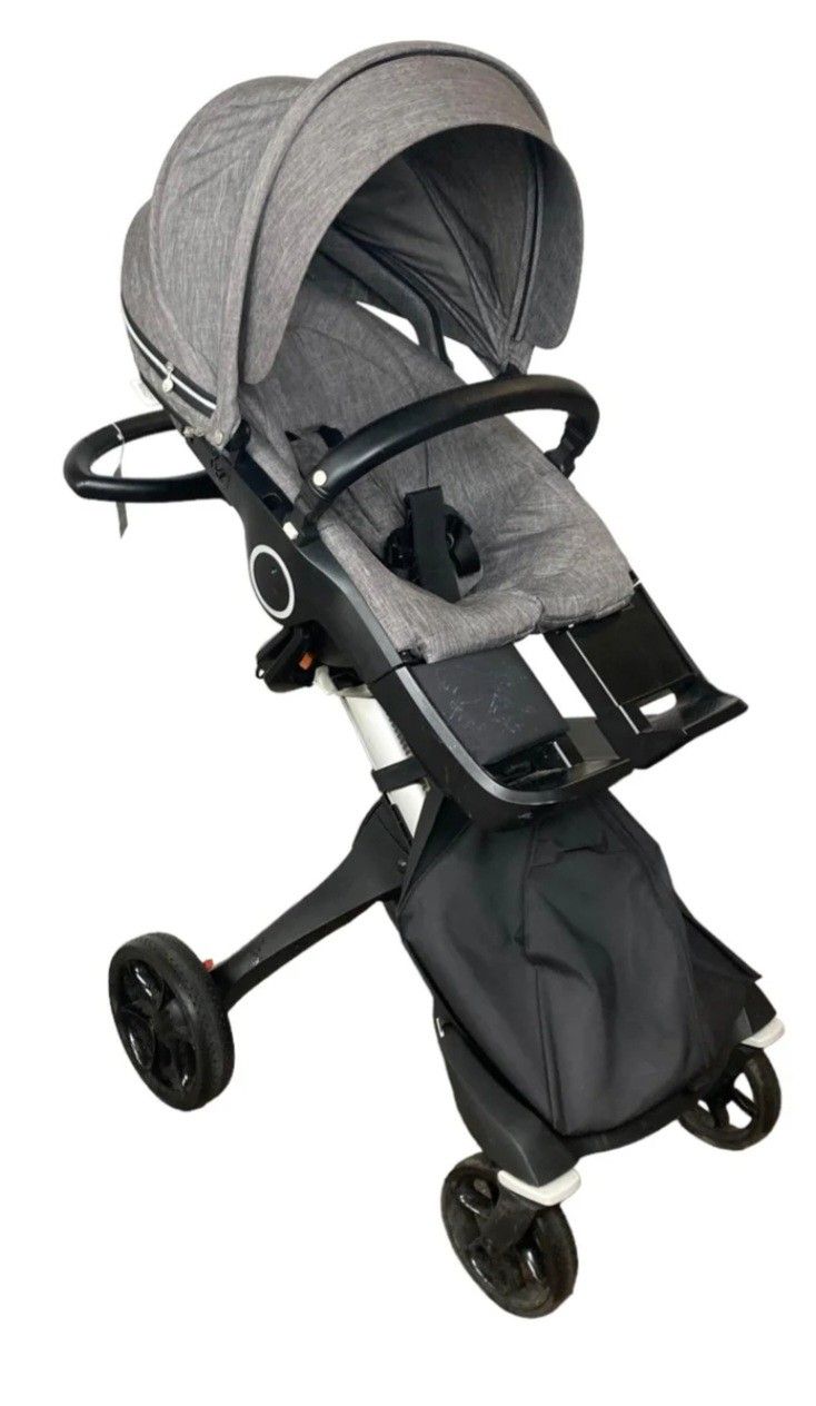 Stokke xplory stroller in good condition. Look at pictures. The handle is covered in tape.