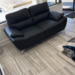 Floor Model. Valencia Black Loveseat. Only $299. Great For A Small Space. Pick Up Or Delivery Available.