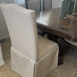  Pair Of Elegant Skirted Dining Chairs – Tailored & Timeless Design