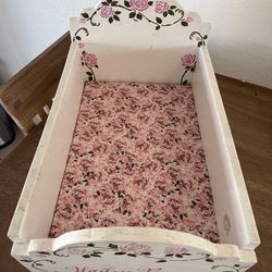 Wooden baby doll bed