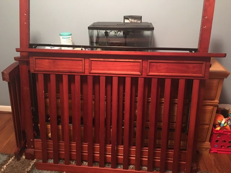 Cherry wood colored crib