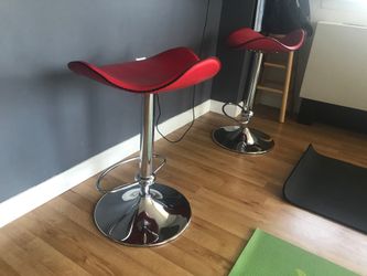 2 red bar stools