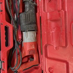 Milwaukee sawzall with case and blades