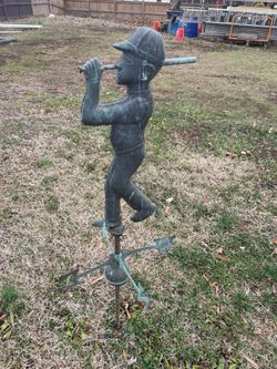 A wind vane, weather vane