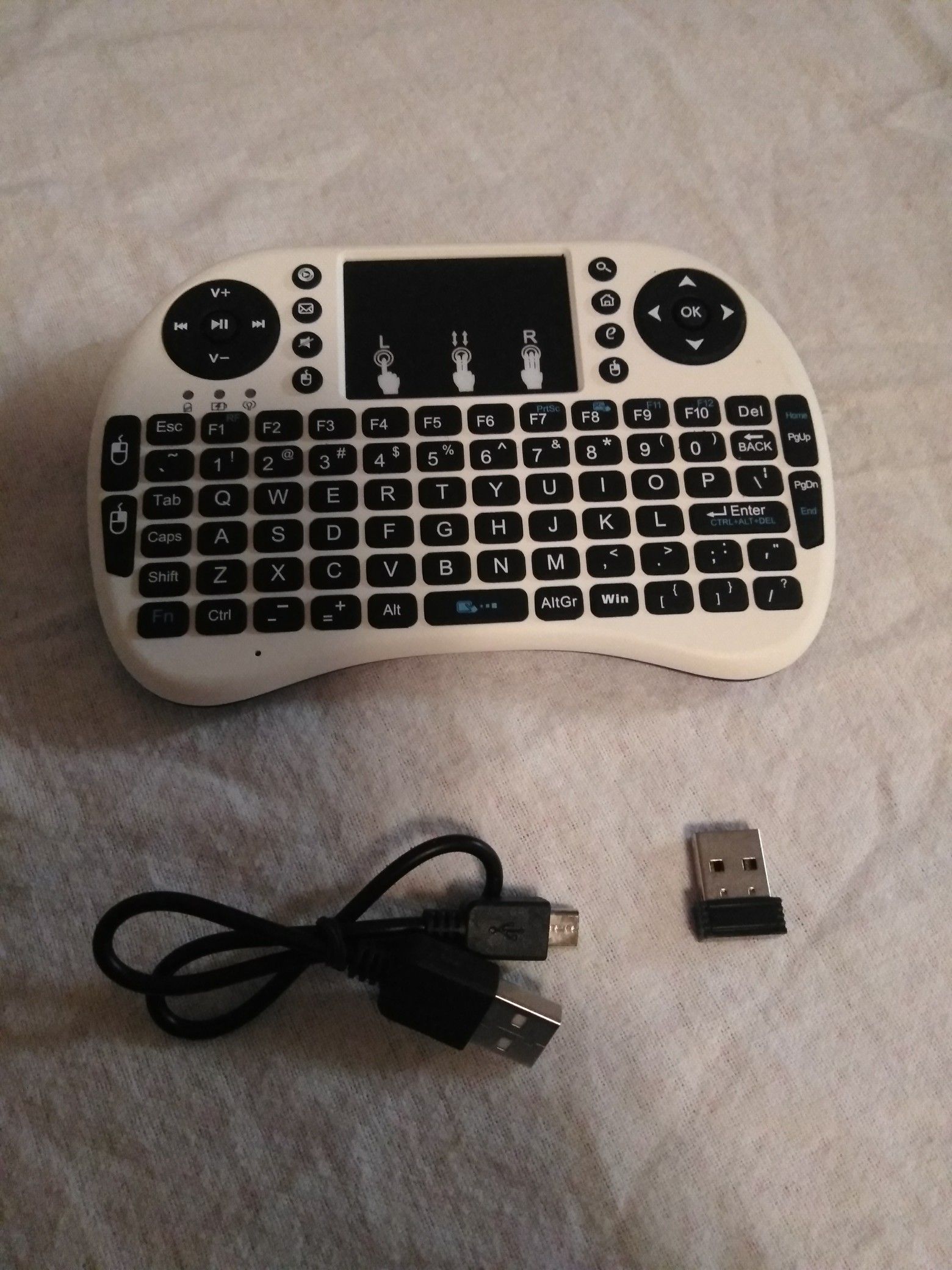 New in box!! Mini keyboard rechargeable... $25