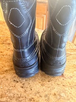 All black North Face ThermaFelt insulated and waterproof  snow boots US size 3 worn during 2 day winter snow trip . Res