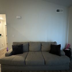 Light Brown Sofa/Couch w/ pillows 