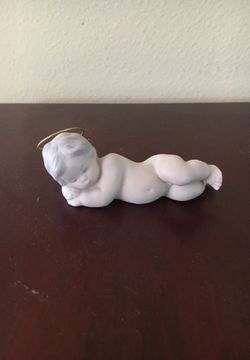 Lladro sleeping cherub with halo