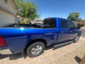 Blue 2016 Dodge Ram 1500 quad cab 4x2 l, SLT Pickup 4D 6 1/4ft. Automatic
