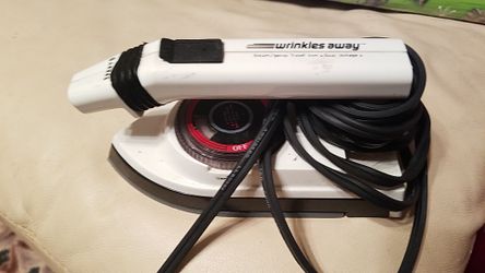 Small steam/spray travel iron (wrinkles away)