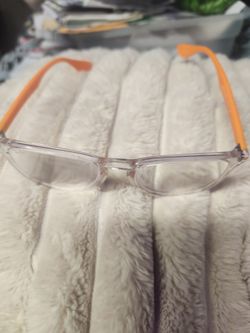 Clear and orange raybans