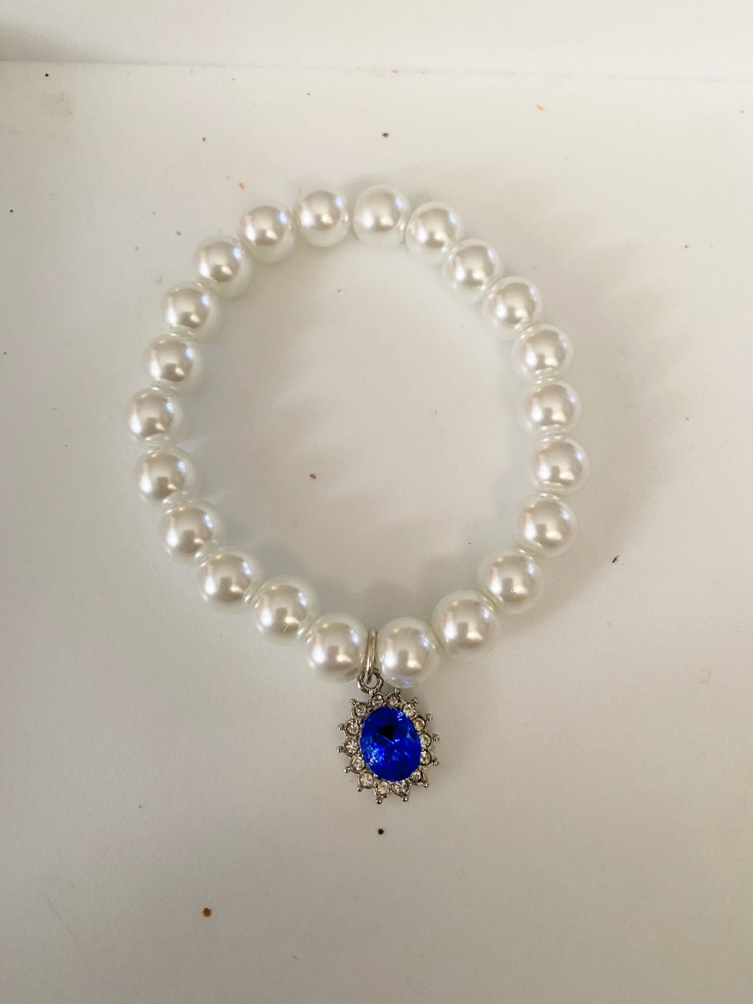 Elegant Pearl Bracelet with Purple Charm