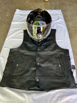 Harley Davidson, leather vest and helmet