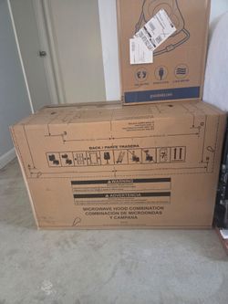 Brand New - still in box - Whirlpool microwave  hood combination