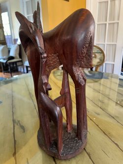 Carved wood animal statue, 16 inches tall Carved wood animal statue, 16 inches tall