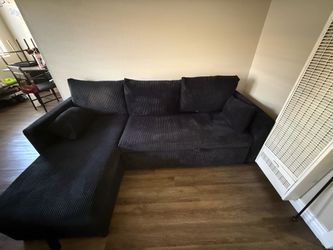 Small black pull out couch